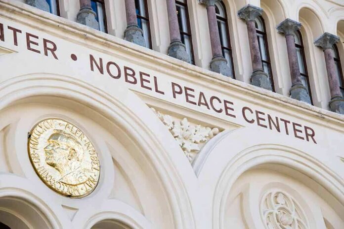 shutterstock_273963650 Nobel Peace Center facade with arched windows and gold medallion
