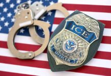 Mayor-Elect Sparks ICE Uproar ICE officer badge and handcuffs on an American flag
